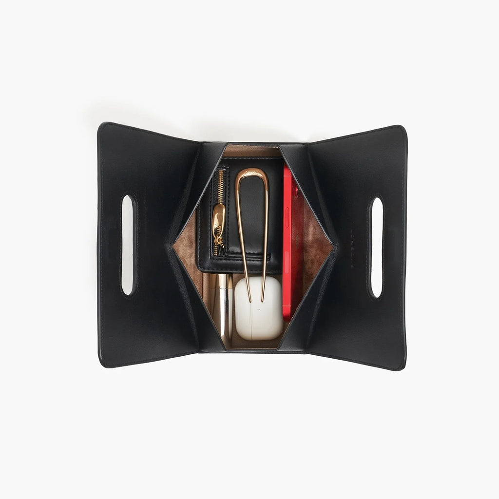 The Fold Up Flat-Packable Leather Clutch